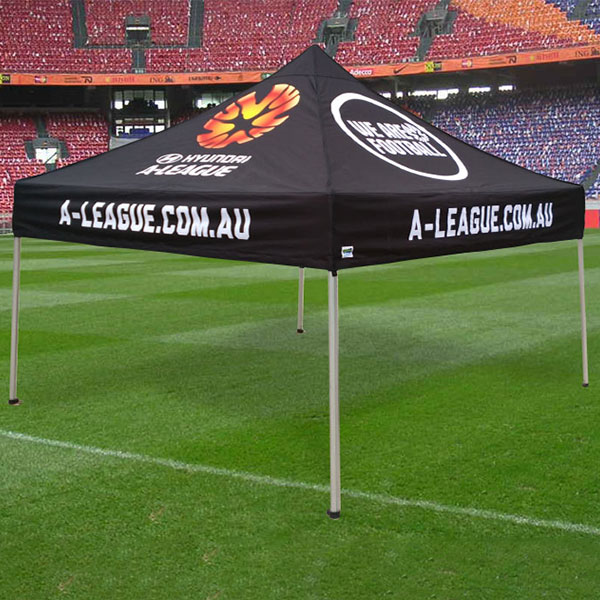 custom marquee on a soccer field with a stadium in the background